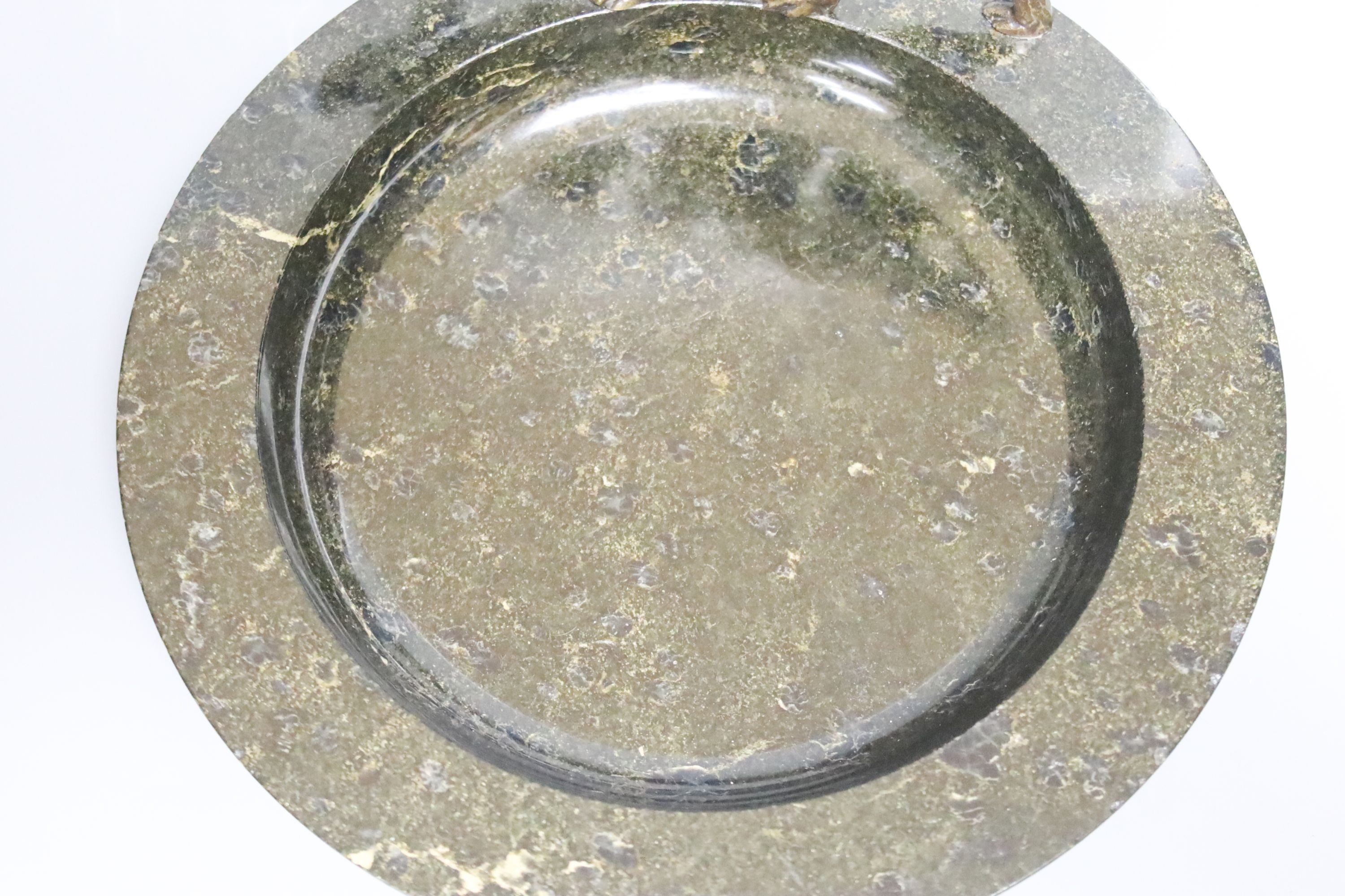 An early 20th century bronze 'setter' serpentine trinket dish, 25cm